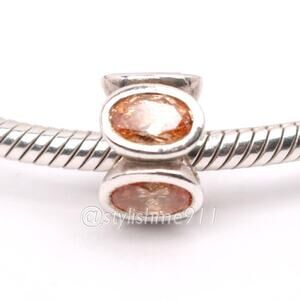 Authentic PANDORA Champagne Oval Lights Charm - 790311CCZ